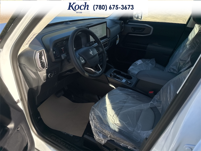 NEW 2026 Ford Bronco Sport Badlands - Oxford White Exterior / DARK SPACE GREY, LEATHER-TRIMMED FRONT SPORT CONTOUR BUCKET SEAT Interior - $50,430 - Stock #A26244 - VIN 3FMCR9DA7TRF11618 - Photo 17