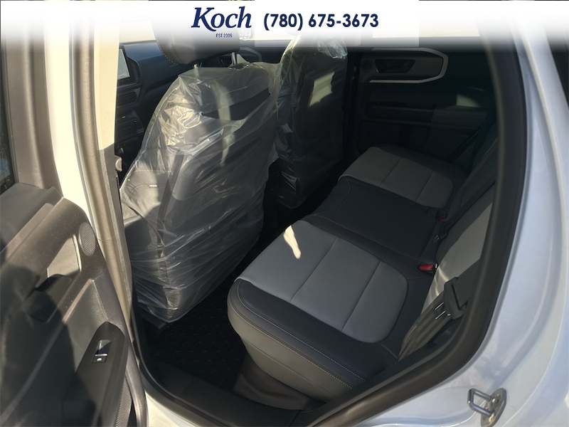 NEW 2026 Ford Bronco Sport Badlands - Oxford White Exterior / DARK SPACE GREY, LEATHER-TRIMMED FRONT SPORT CONTOUR BUCKET SEAT Interior - $50,430 - Stock #A26244 - VIN 3FMCR9DA7TRF11618 - Photo 18