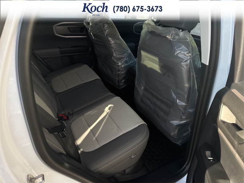 NEW 2026 Ford Bronco Sport Badlands - Oxford White Exterior / DARK SPACE GREY, LEATHER-TRIMMED FRONT SPORT CONTOUR BUCKET SEAT Interior - $50,430 - Stock #A26244 - VIN 3FMCR9DA7TRF11618 - Photo 20