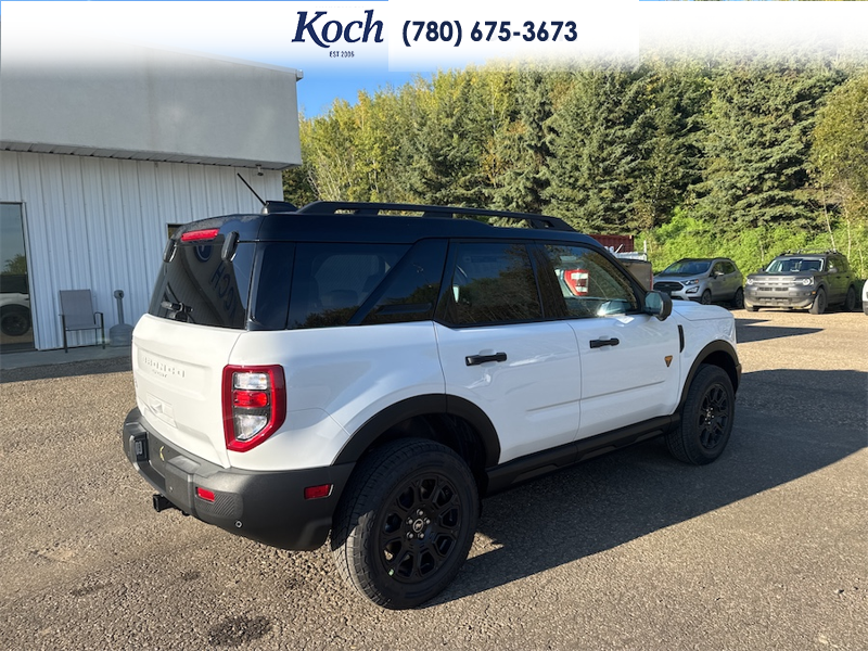 NEW 2026 Ford Bronco Sport Badlands - Oxford White Exterior / DARK SPACE GREY, LEATHER-TRIMMED FRONT SPORT CONTOUR BUCKET SEAT Interior - $50,430 - Stock #A26244 - VIN 3FMCR9DA7TRF11618 - Photo 2