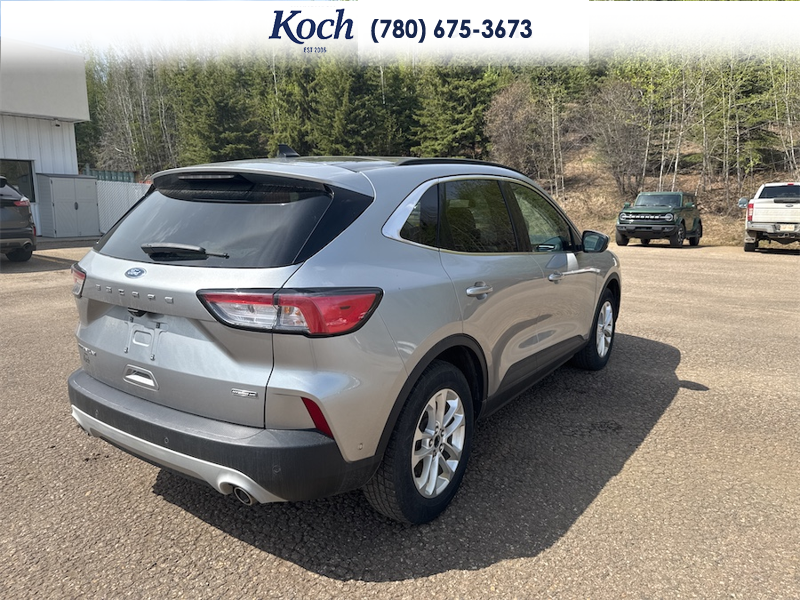 USED 2021 Ford Escape Titanium Hybrid AWD - Silver Exterior - $26,995 - Stock #AR559 - VIN 1FMCU9DZ5MUA24772 - Photo 2