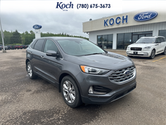 USED 2022 Ford Edge Titanium - Carbonized Grey Metallic Exterior - $29,995 - Stock #A26193A - VIN 2FMPK4K96NBA29158