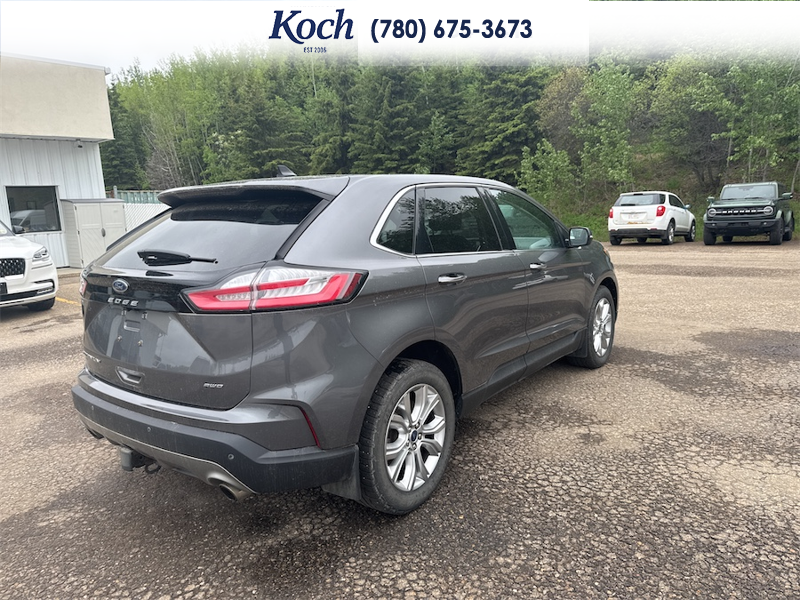 USED 2022 Ford Edge Titanium - Carbonized Grey Metallic Exterior - $29,995 - Stock #A26193A - VIN 2FMPK4K96NBA29158 - Photo 2