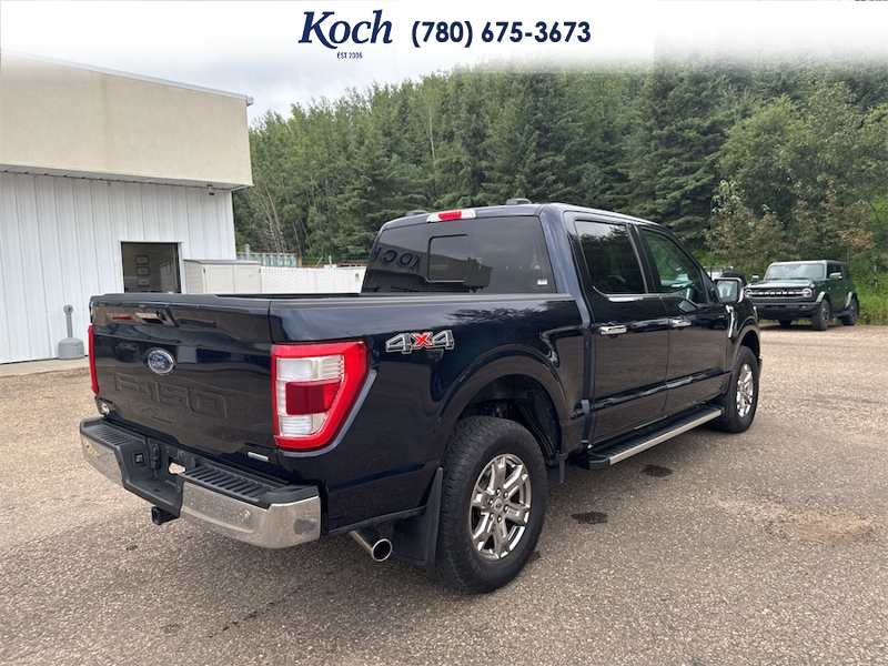 USED 2022 Ford F-150 Lariat - Antimatter Blue Metallic Exterior - $48,995 - Stock #AR666 - VIN 1FTFW1E89NFB25399 - Photo 2