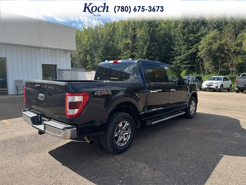 USED 2022 Ford F-150 Lariat - Antimatter Blue Metallic Exterior - $41,995 - Stock #AP719 - VIN 1FTFW1E58NFA36283 - Photo 2