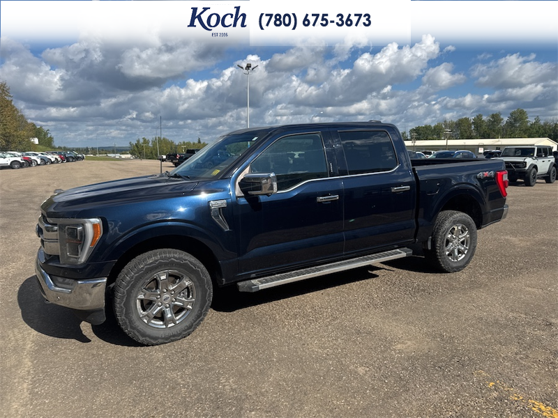 USED 2022 Ford F-150 Lariat - Antimatter Blue Metallic Exterior - $41,995 - Stock #AP719 - VIN 1FTFW1E58NFA36283 - Photo 5