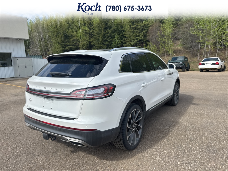 USED 2022 Lincoln Nautilus Reserve - Pristine White Metallic Tri-coat Exterior / EBONY PERFORATED LEATHER Interior - $41,995 - Stock #AR516 - VIN 2LMPJ8KP5NBL15659 - Photo 2