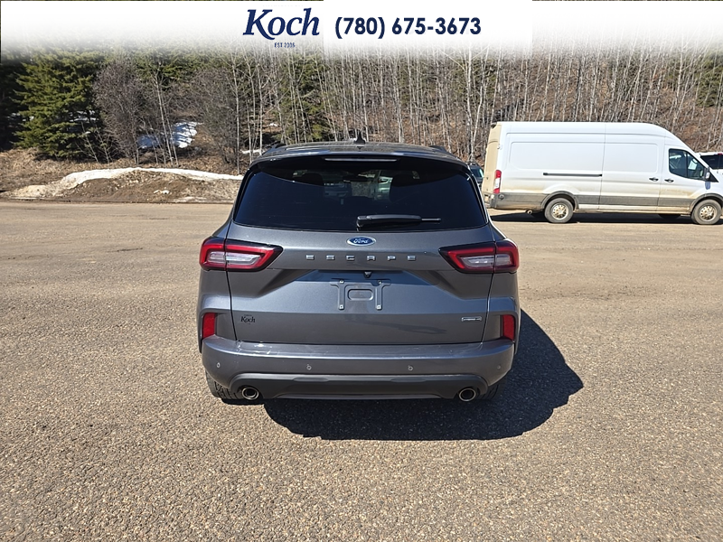 USED 2023 Ford Escape ST-Line Select - Carbonized Grey Metallic Exterior / EBONY VINYL/ RED STITCHING Interior - $29,995 - Stock #A26085A - VIN 1FMCU9NZ8PUA93510 - Photo 11