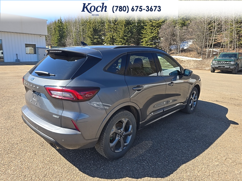 USED 2023 Ford Escape ST-Line Select - Carbonized Grey Metallic Exterior / EBONY VINYL/ RED STITCHING Interior - $29,995 - Stock #A26085A - VIN 1FMCU9NZ8PUA93510 - Photo 12