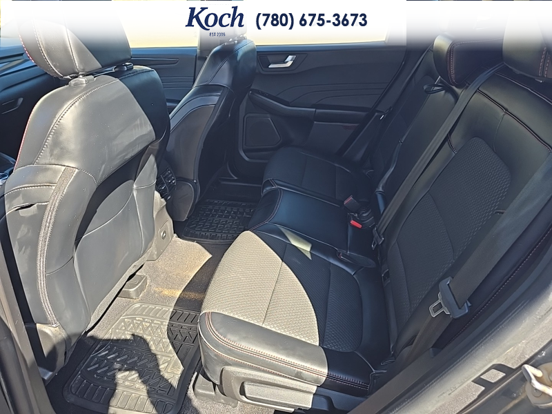 USED 2023 Ford Escape ST-Line Select - Carbonized Grey Metallic Exterior / EBONY VINYL/ RED STITCHING Interior - $29,995 - Stock #A26085A - VIN 1FMCU9NZ8PUA93510 - Photo 19