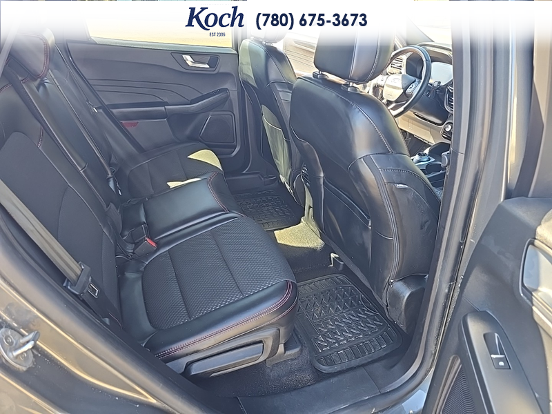 USED 2023 Ford Escape ST-Line Select - Carbonized Grey Metallic Exterior / EBONY VINYL/ RED STITCHING Interior - $29,995 - Stock #A26085A - VIN 1FMCU9NZ8PUA93510 - Photo 21