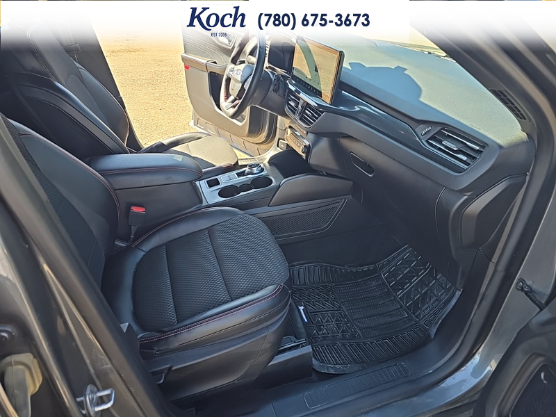 USED 2023 Ford Escape ST-Line Select - Carbonized Grey Metallic Exterior / EBONY VINYL/ RED STITCHING Interior - $29,995 - Stock #A26085A - VIN 1FMCU9NZ8PUA93510 - Photo 22