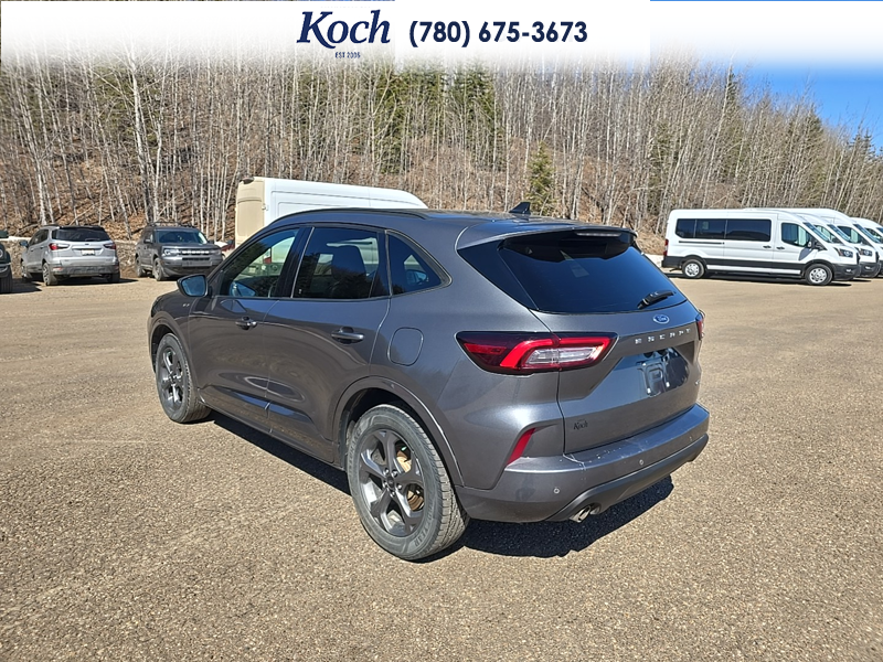 USED 2023 Ford Escape ST-Line Select - Carbonized Grey Metallic Exterior / EBONY VINYL/ RED STITCHING Interior - $29,995 - Stock #A26085A - VIN 1FMCU9NZ8PUA93510 - Photo 3