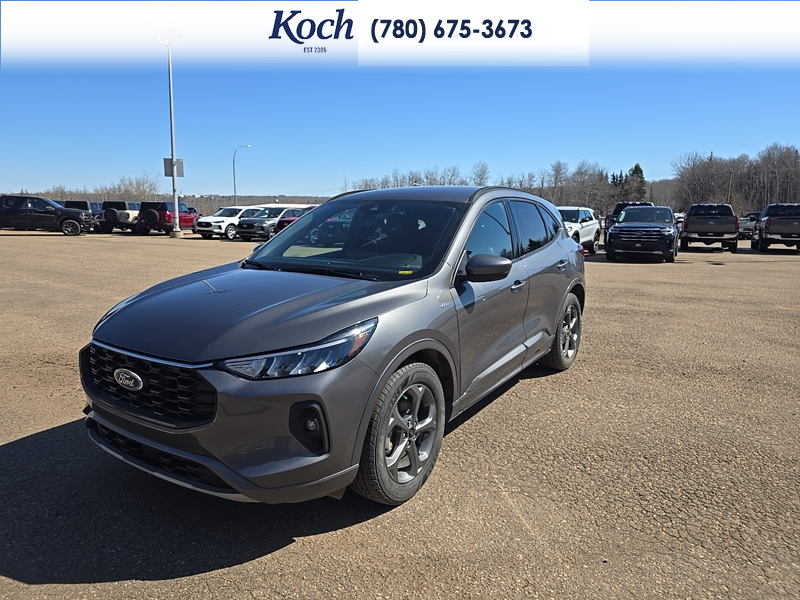 USED 2023 Ford Escape ST-Line Select - Carbonized Grey Metallic Exterior / EBONY VINYL/ RED STITCHING Interior - $29,995 - Stock #A26085A - VIN 1FMCU9NZ8PUA93510 - Photo 4