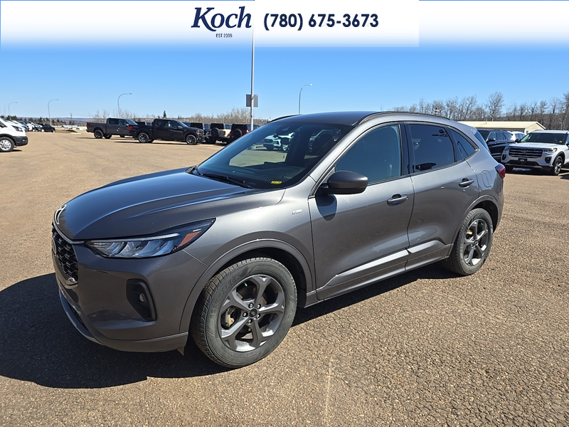 USED 2023 Ford Escape ST-Line Select - Carbonized Grey Metallic Exterior / EBONY VINYL/ RED STITCHING Interior - $29,995 - Stock #A26085A - VIN 1FMCU9NZ8PUA93510 - Photo 5