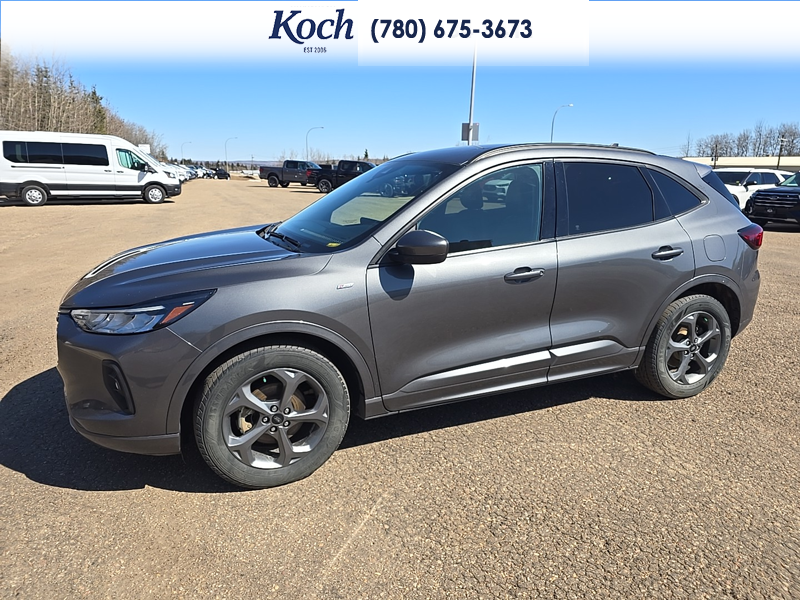 USED 2023 Ford Escape ST-Line Select - Carbonized Grey Metallic Exterior / EBONY VINYL/ RED STITCHING Interior - $29,995 - Stock #A26085A - VIN 1FMCU9NZ8PUA93510 - Photo 7