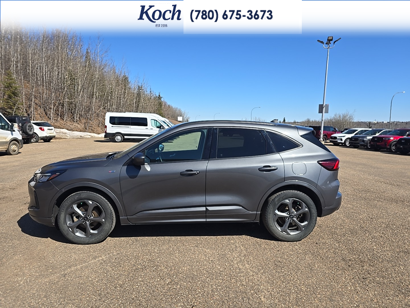 USED 2023 Ford Escape ST-Line Select - Carbonized Grey Metallic Exterior / EBONY VINYL/ RED STITCHING Interior - $29,995 - Stock #A26085A - VIN 1FMCU9NZ8PUA93510 - Photo 8