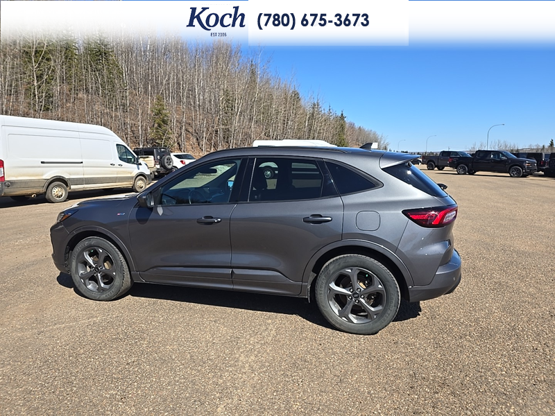 USED 2023 Ford Escape ST-Line Select - Carbonized Grey Metallic Exterior / EBONY VINYL/ RED STITCHING Interior - $29,995 - Stock #A26085A - VIN 1FMCU9NZ8PUA93510 - Photo 9