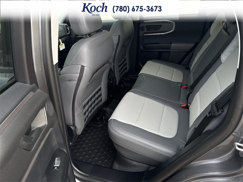 NEW 2025 Ford Bronco Sport Badlands - Carbonized Grey Metallic Exterior / DARK SPACE GREY LEATHER Interior - $54,615 - Stock #A25286 - VIN 3FMCR9DA8SRF75018 - Photo 18