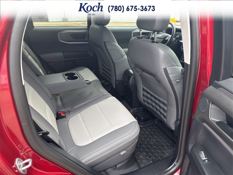 NEW 2025 Ford Bronco Sport Badlands - Ruby Red Tri-coat Metallic Exterior / DARK SPACE GREY LEATHER Interior - $54,660 - Stock #A25287 - VIN 3FMCR9DA6SRF73963 - Photo 20