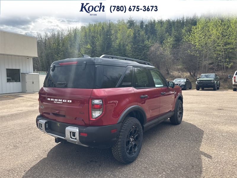 NEW 2025 Ford Bronco Sport Badlands - Ruby Red Tri-coat Metallic Exterior / DARK SPACE GREY LEATHER Interior - $54,660 - Stock #A25287 - VIN 3FMCR9DA6SRF73963 - Photo 2