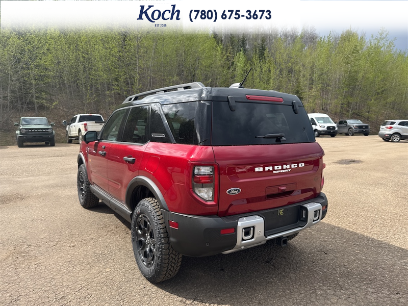NEW 2025 Ford Bronco Sport Badlands - Ruby Red Tri-coat Metallic Exterior / DARK SPACE GREY LEATHER Interior - $54,660 - Stock #A25287 - VIN 3FMCR9DA6SRF73963 - Photo 3
