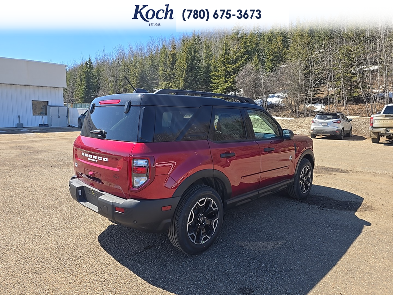 NEW 2026 Ford Bronco Sport Outer Banks - Ruby Red Tri-coat Metallic Exterior / EBONY BROWN VINYL Interior - $42,290 - Stock #A26145 - VIN 3FMCR9CN2TRE36671 - Photo 2