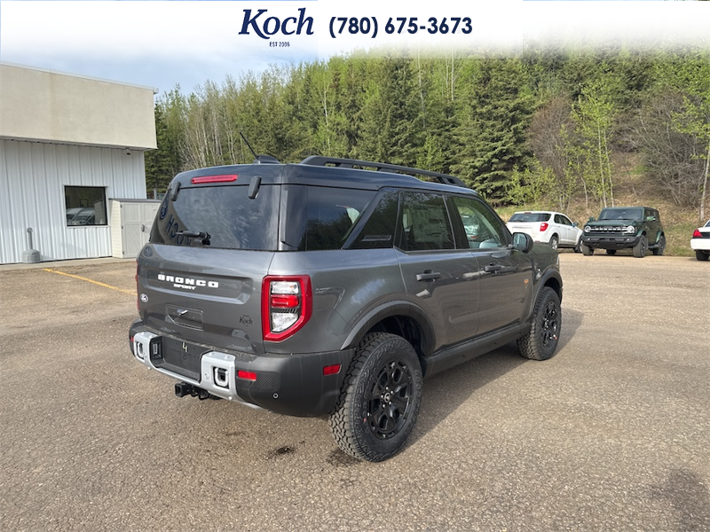 NEW 2026 Ford Bronco Sport Badlands - Carbonized Grey Metallic Exterior / DARK SPACE GREY LEATHER Interior - $54,650 - Stock #A26058 - VIN 3FMCR9DAXTRE09097 - Photo 2