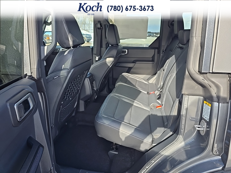 NEW 2026 Ford Bronco Big Bend - Carbonized Grey Metallic Exterior / CARMELO PLATINUM LEATHER BUCKET Interior - $64,730 - Stock #A26033 - VIN 1FMDE7BH6TLA44727 - Photo 18