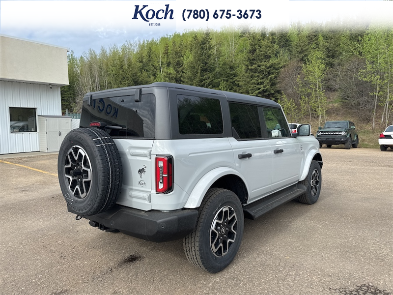 NEW 2026 Ford Bronco Outer Banks - Avalanche Exterior / BLACK ONYX LEATHER TRIM/VINYL Interior - $72,340 - Stock #A26078 - VIN 1FMDE8BH6TLA58407 - Photo 2