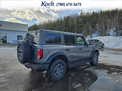 NEW 2026 Ford Bronco Big Bend - Carbonized Grey Metallic Exterior / CARMELO PLATINUM LEATHER BUCKET Interior - $64,730 - Stock #A26033 - VIN 1FMDE7BH6TLA44727