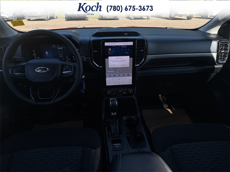 USED 2026 Ford Ranger XLT - Ruby Red Tri-coat Metallic Exterior / BLACK ONYX XLT CLOTH Interior - $49,995 - Stock #A26090A - VIN 1FTER4HHXTLE09039 - Photo 19